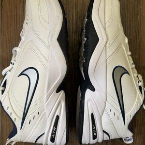 Men's Nike Air Monarch size 9 E width. White with blue trimmings.